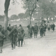 Liberated prisoners leave the camp